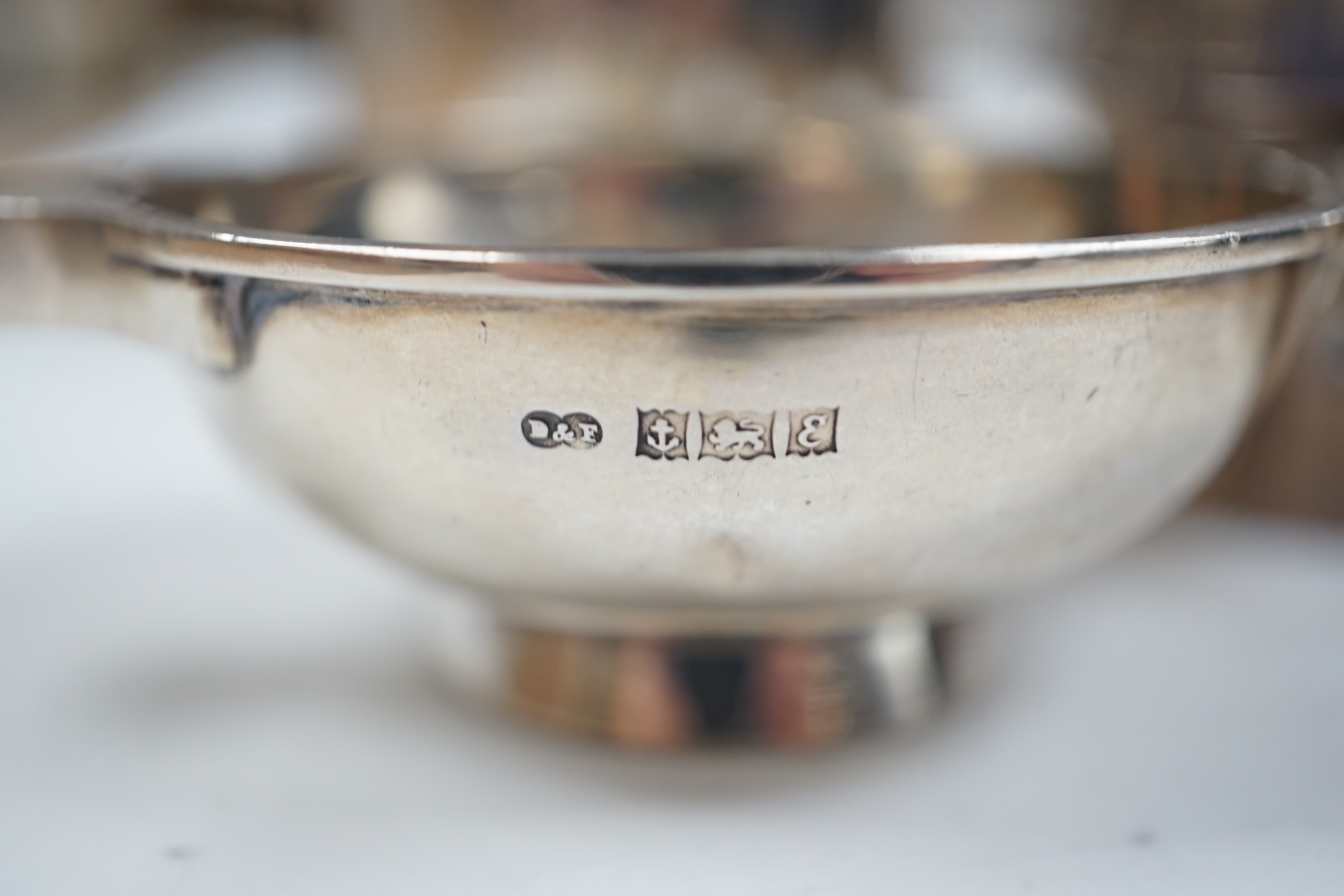 Small silver to include a christening mug, a Victorian milk jug, London, 1872 a trinket box, a small quaich and two napkin rings.